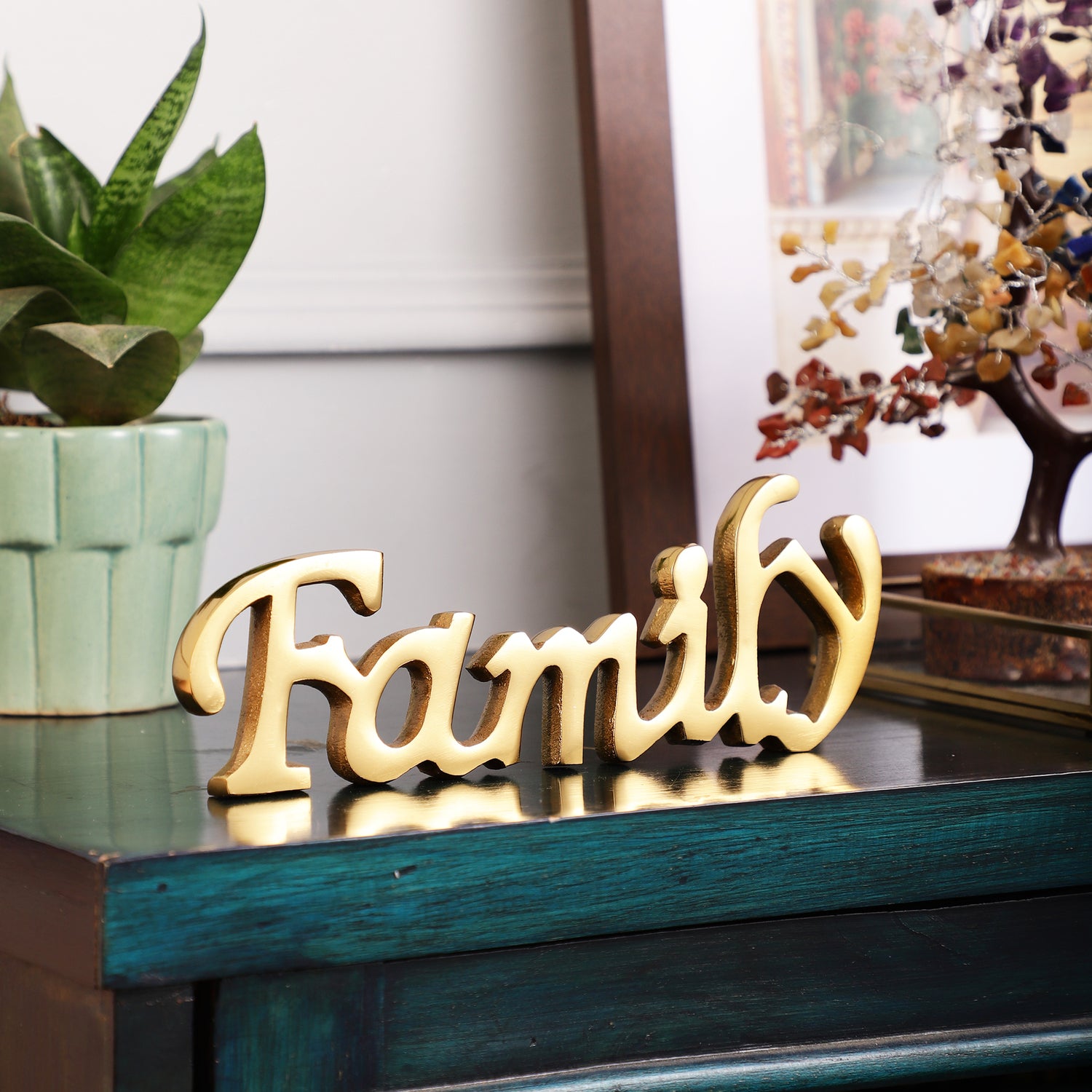 Elegant Rakhi Hamper with Metallic Family Showpiece