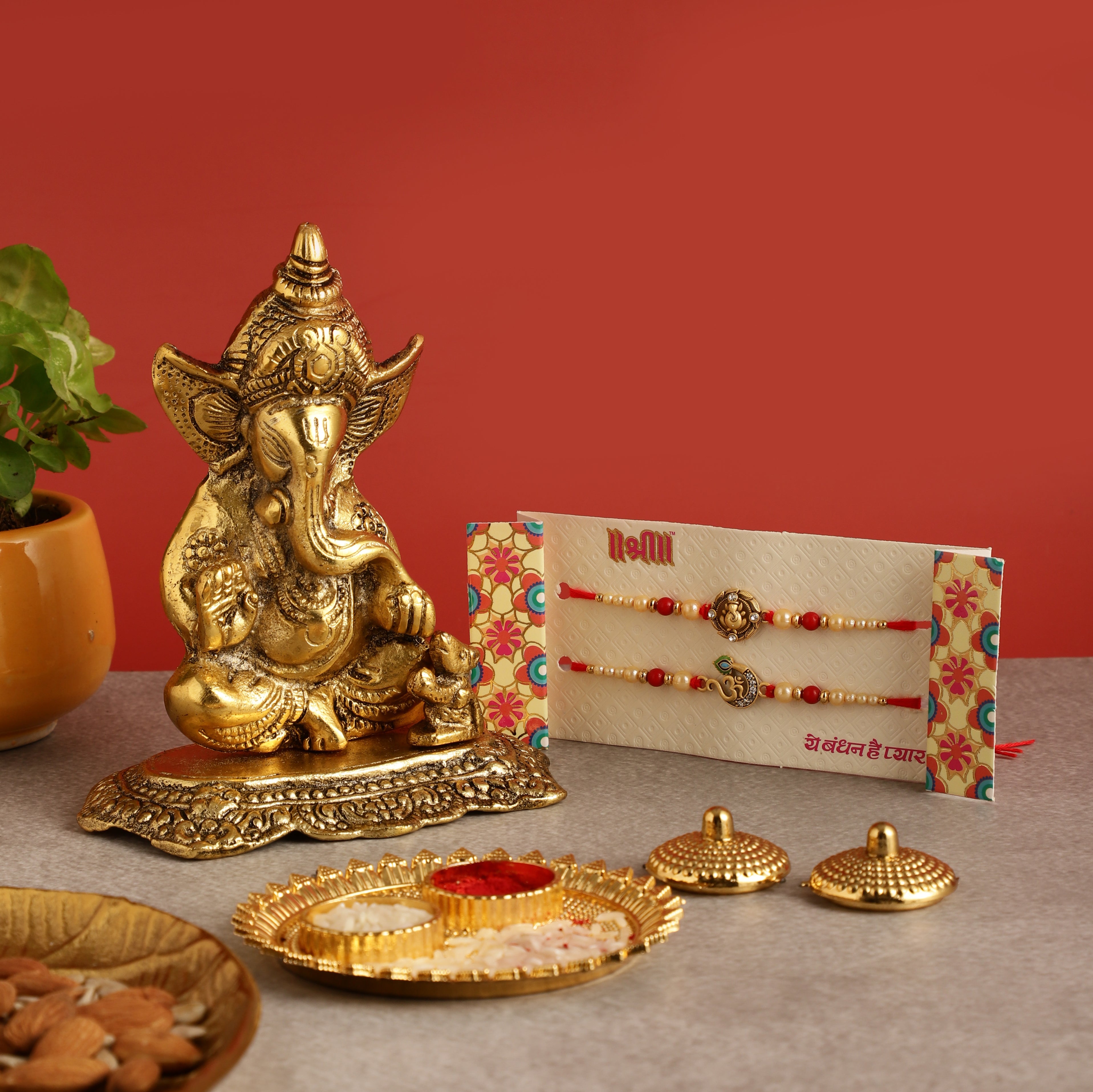 Divine Blessings Rakhi Box with Golden Ganesha Idol